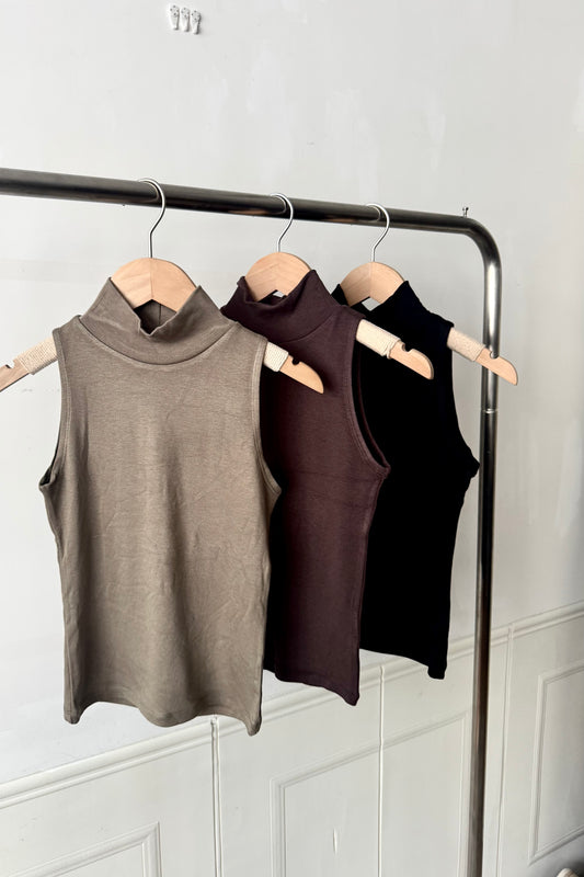 250931 90s sleeveless turtleneck